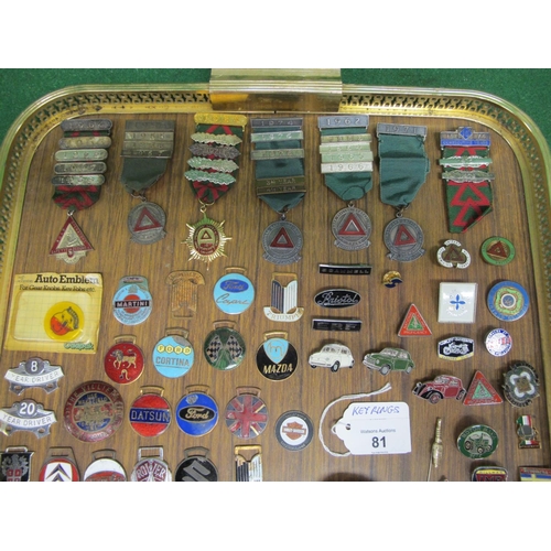 81 - Tray of key ring fobs, badges, Safe Driving medals with year bars etc, all with a connection to road... 