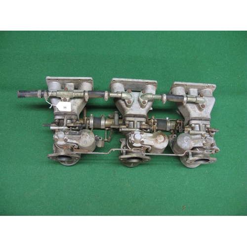 98 - Set of Triple SU carburettors on an intake manifold with air filter box, believed to be Jaguar