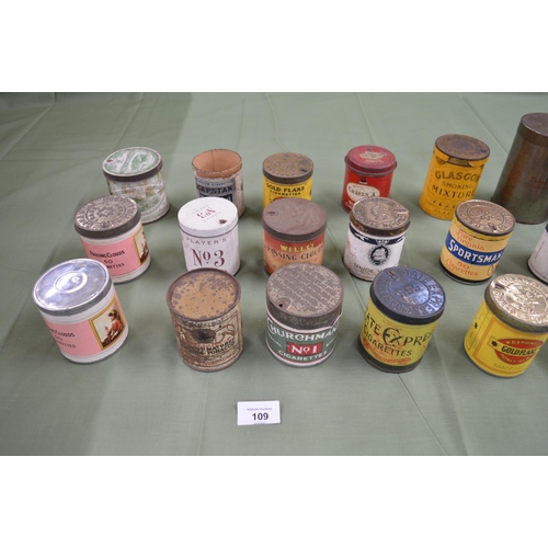 109 - Group of thirty seven cylindrical cigarette and tobacco tins, some retaining contents