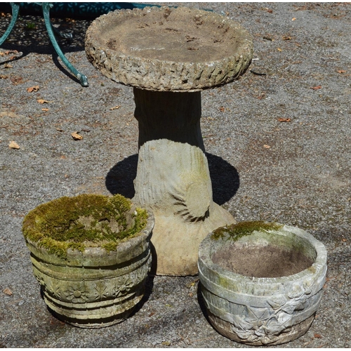 37 - A circular bird bath and two small planters