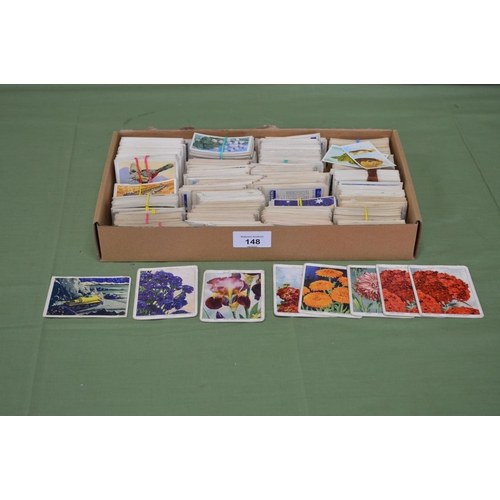 148 - Box of cigarette and tea cards