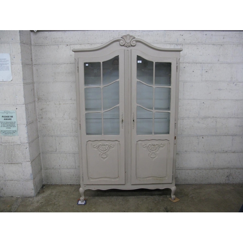 303 - Painted two door glazed cabinet - 44.5