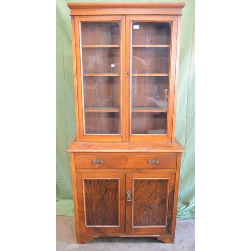 341 - Walnut glazed bookcase on cupboard - 34.75