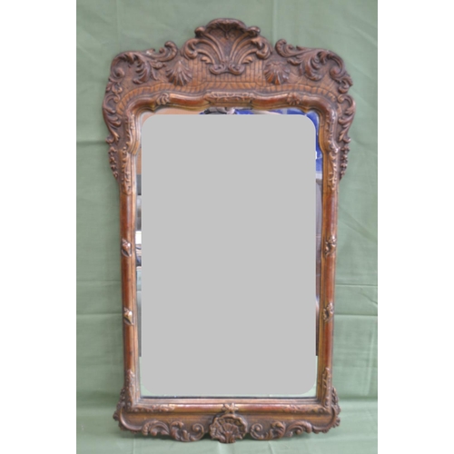 215 - Gilt framed wall mirror with shell motif's - 16.25