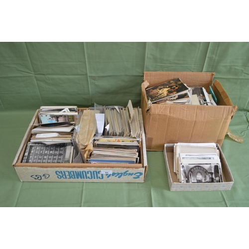 83 - Two boxes of assorted postcards