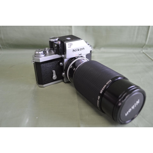 234 - Nikon F 35mm SLR camera and Nikon Photomic FTN finder and Nikon Zoon-Nikkor 80-200mm 1:4 188894 lens... 