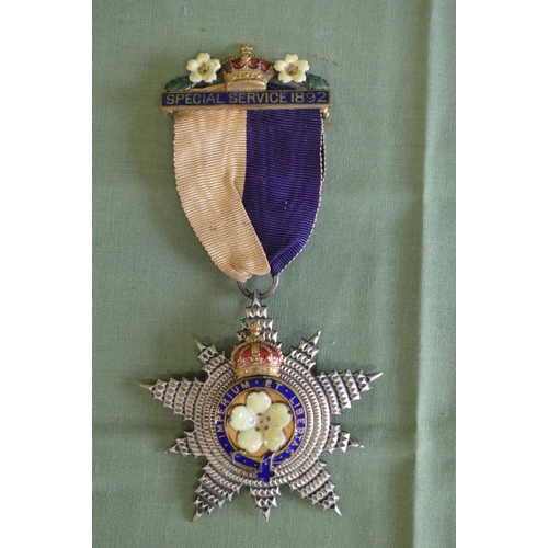 242 - 1892 white metal and enamel Primrose League Honourable Order Of The Grand Star badge in later case