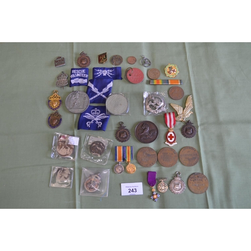 243 - Quantity of fobs, medals and tokens etc to include a silver ARP badge