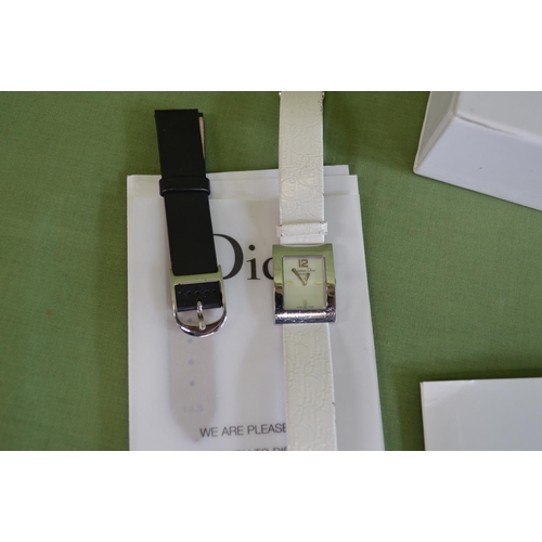 253 - Boxed Christian Dior ladies watch complete with paperwork and spare strap (not authenticated)