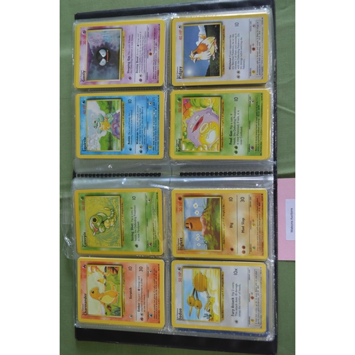 263 - Pokemon trading card game folder containing over 300 trading cards, many in multiples of same cards ... 