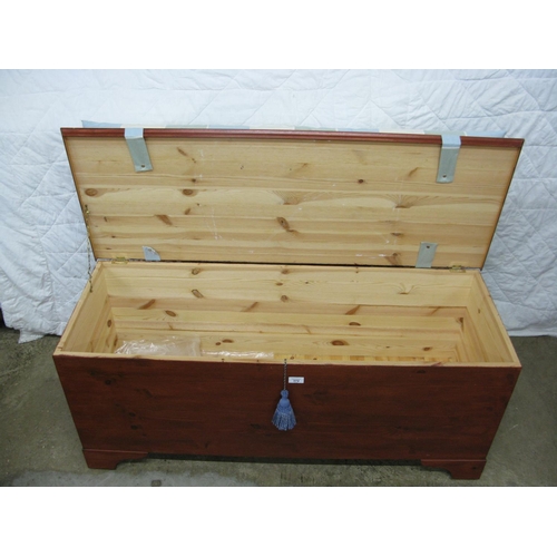 372 - Stained pine blanket box with cushion seat - 48.25