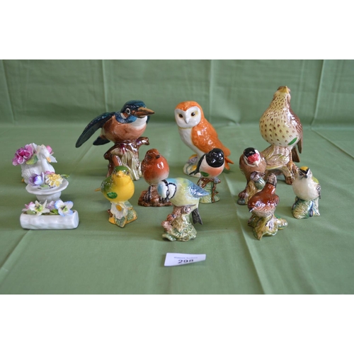 298 - Collection of ten Beswick birds to include: Robin 980, Goldfinch 2273, Greenfinch 2105 etc