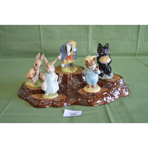 300 - Collection of five Beswick Beatrix Potter figures to comprise: Mrs Flopsy Bunny, Benjamin Bunny Sat ... 