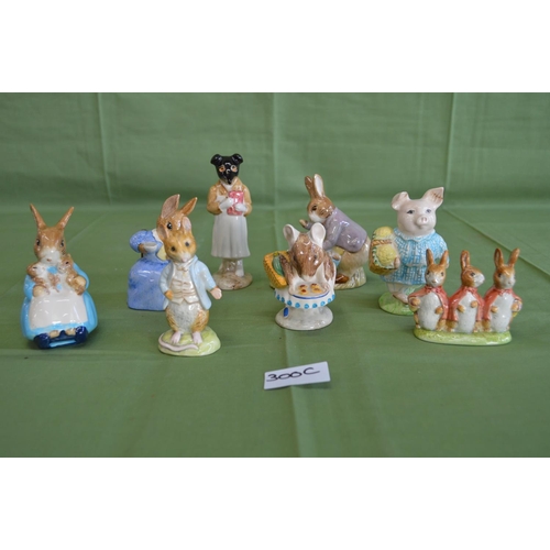 300C - Collection of eight Beswick Beatrix Potter figures to comprise: Mrs Rabbit & Bunnies, Mr Benjamin Bu... 