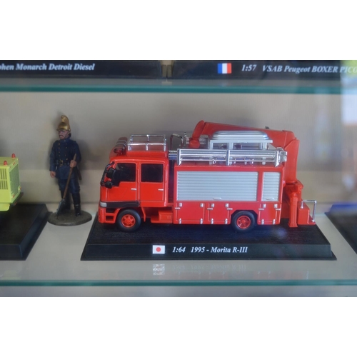 170A - Wall mounted display case containing twenty eight model fire engines from around the world and one f... 