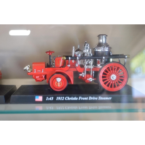 170A - Wall mounted display case containing twenty eight model fire engines from around the world and one f... 