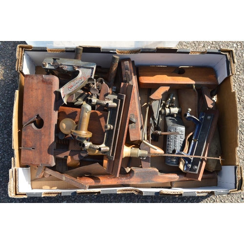 47 - Three boxes of wood working tools to include wood planes together with gun cleaning rods