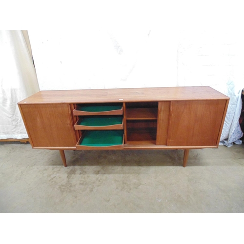 489 - Mid century sideboard in teak finish having four sliding doors - 78.75