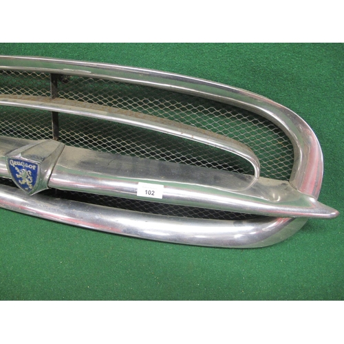 102 - Elliptical radiator grill with central Peugeot badge - total width 38.5