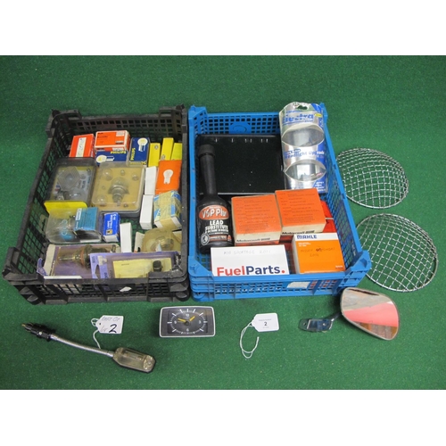 2 - Two crates of auto bulbs and filters together with stone guards, map light, Ford dashboard clock, ch... 