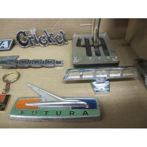 20 - Box of vehicle marque badges to include: Mustang, Supervan III, Custom Cab, Viva, Futura, Dees Of Bi... 