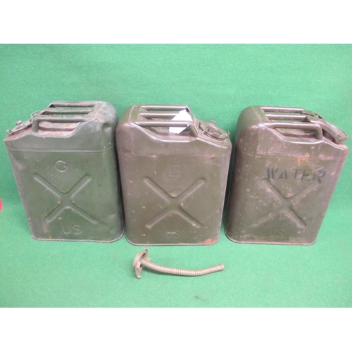 39 - Three US Jerry cans to comprise:  two fuel (1951 and 1980) one of which has a flexible nozzle and on... 