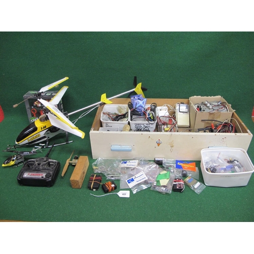 402 - Quantity of pre-used radio control items and chargers together with two helicopters and a small inte... 