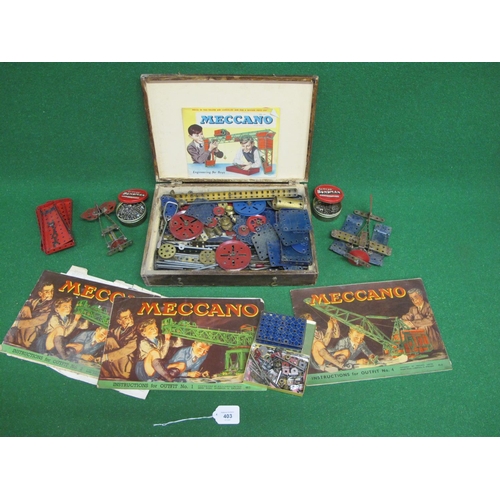 403 - Old wooden box of playworn blue, red and gold coloured Meccano with instructions for Outfits 1, 3 an... 