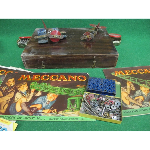 403 - Old wooden box of playworn blue, red and gold coloured Meccano with instructions for Outfits 1, 3 an... 