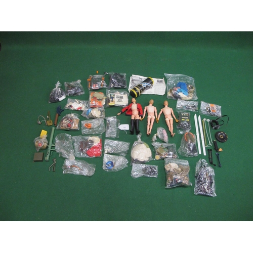 405 - Three different Action Men, Made in England by Palitoy with a large quantity of clothing, weapons, a... 