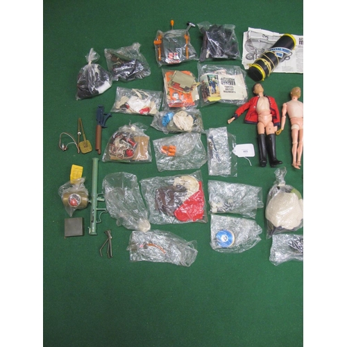 405 - Three different Action Men, Made in England by Palitoy with a large quantity of clothing, weapons, a... 