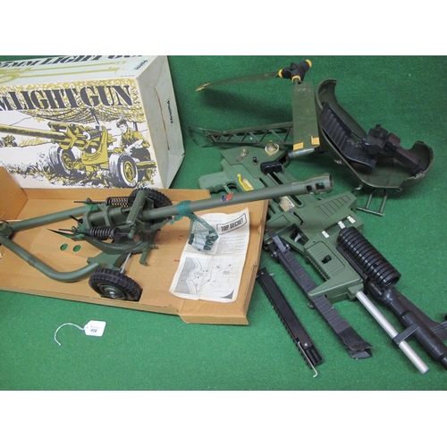 406 - Action Man 105mm Light Gun with shells and box, four wheel vehicle, helicopter (for spares) together... 