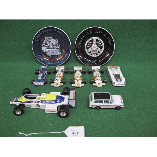 407 - Five loose diecast racing cars from Corgi and Burago, a Team Castrol Racing & Rally Service Range Ro... 