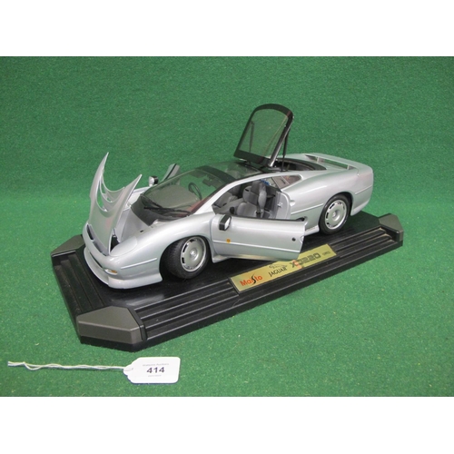 414 - 1:12 scale metal and plastic detailed model of a 1992 Jaguar XJ220 with many moving parts, display b... 