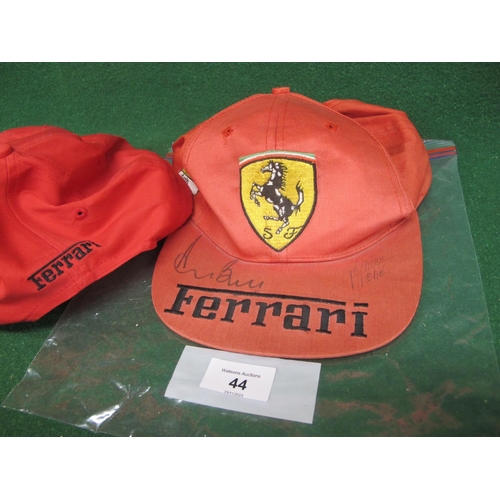 44 - Two Ferrari baseball caps, one is an official product, both signed on the peaks by Derek Bell & Rene... 