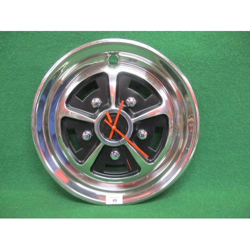 49 - Battery powered bespoke wall clock made with a Rostyle wheel trim