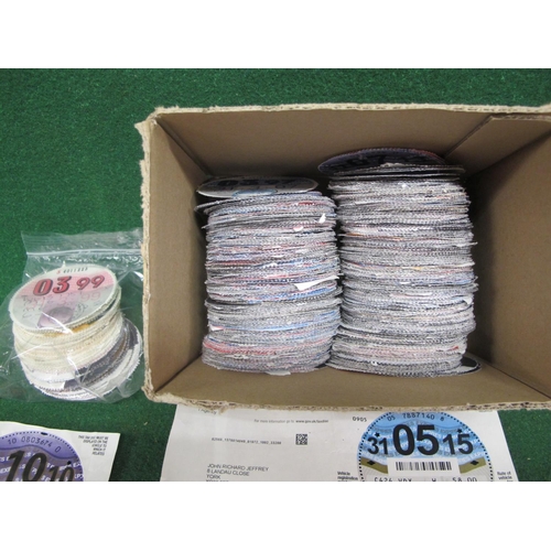 76 - Large quantity of used tax discs, mostly from the 2000's, but with a few from 1990's, 1980's and a 1... 