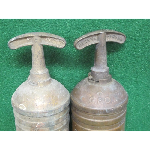 96 - Two Pyrene Type P1 one quart brass hand pump fire extinguishers, one embossed GPO at the top