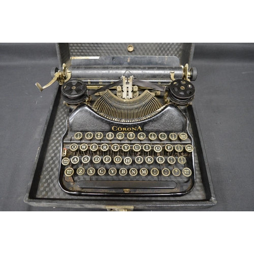 121 - Vintage black Corona typewriter in hard carrying case