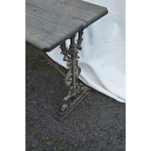 22 - 20th century iron base garden table with rectangular wooden top - 42