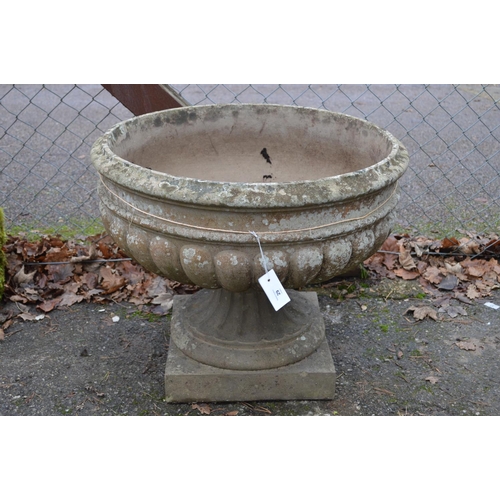 29 - Single 20th century concrete garden urn of shallow proportions with gadrooned bowl and standing on s... 