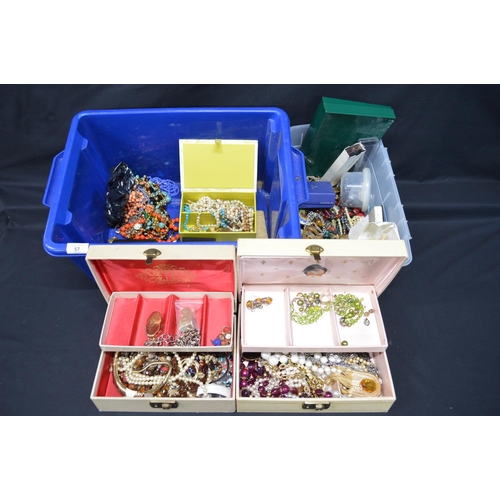 57 - Two boxes containing a quantity of costume jewellery