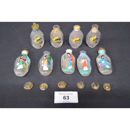 63 - Group of nine late 20th century glass scent bottles decorated with panels of figures