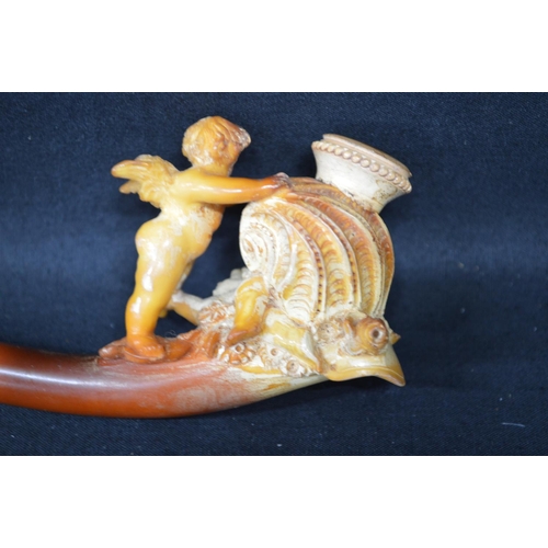 154 - Carved Meerschaum pipe, the bowl in the form of a cherub and shell, contained in fitted case - 4.75