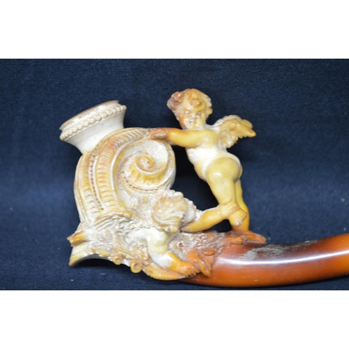 154 - Carved Meerschaum pipe, the bowl in the form of a cherub and shell, contained in fitted case - 4.75