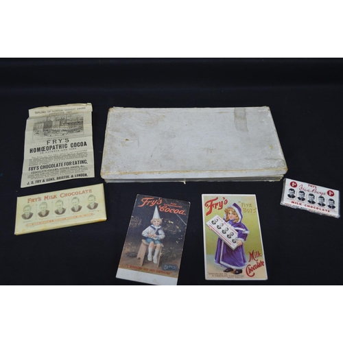 174 - Quantity of Fry's Milk Chocolate memorabilia to include: two postcards, two chocolate bar wrappers, ... 