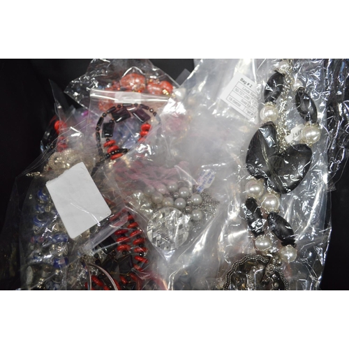 208 - Three boxes of costume jewellery and quantity of gift bags together with three necklace stands