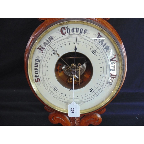 238 - Oak carved Aneroid barometer - 37.75