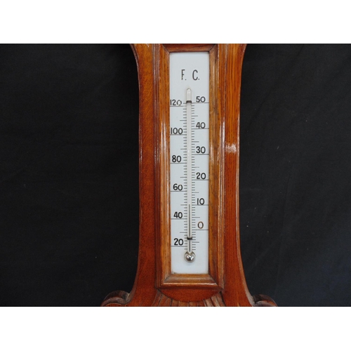 238 - Oak carved Aneroid barometer - 37.75