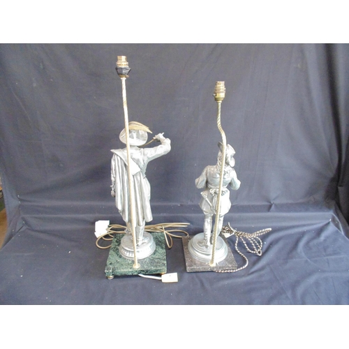 240 - Two cast metal figural table lamps int he form of Cavaliers, standing on square bases - 18